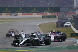 Lewis Hamilton, Mercedes AMG F1 W09, leads Esteban Ocon, Force India VJM11