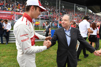 Charles Leclerc, Alfa Romeo Sauber F1 Team on the grid with Jean Todt, FIA President