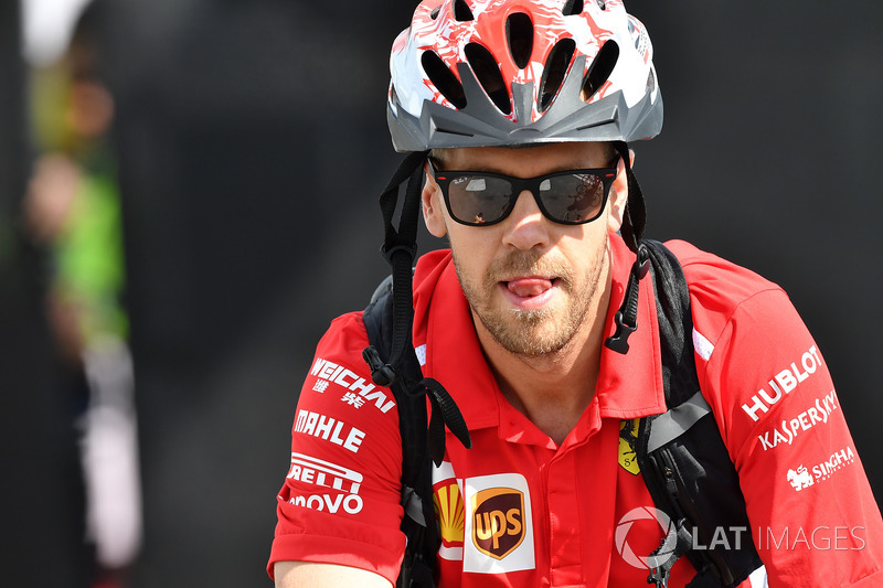 Sebastian Vettel, Ferrari on a bike 