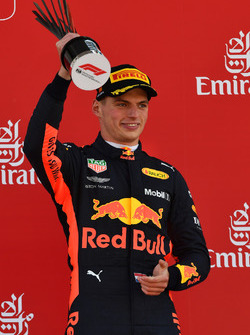 Max Verstappen, Red Bull Racing celebrates on the podium with the trophy