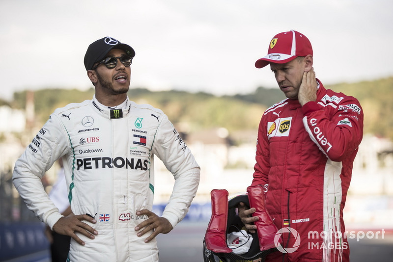 Lewis Hamilton, Mercedes AMG F1, and Sebastian Vettel, Ferrari