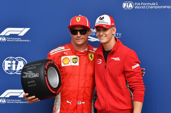 Mick Shcumacher presents the Pirelli Pole Position Award to Kimi Raikkonen, Ferrari