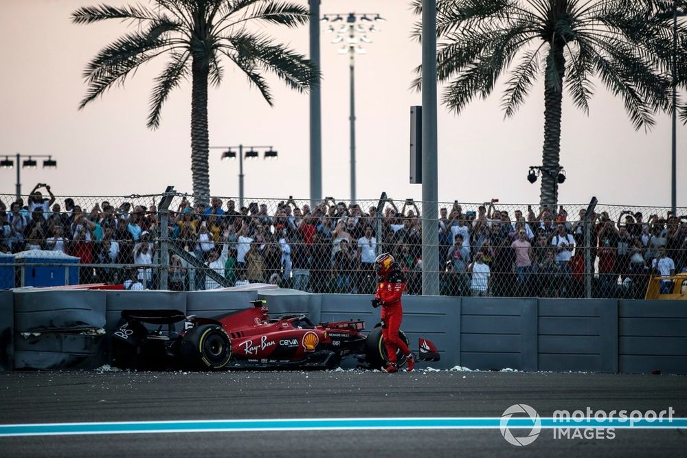 Carlos Sainz, Ferrari SF-23, climbs out of his damaged car after crashing out in FP2