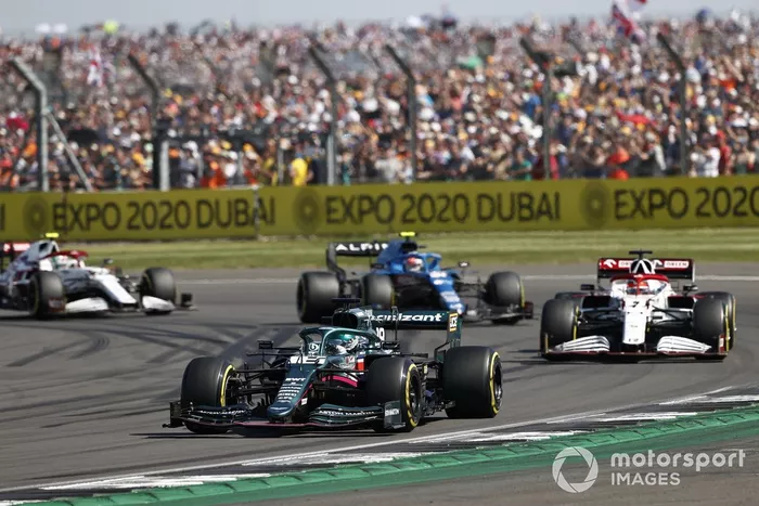 Lance Stroll, Aston Martin AMR21 , Kimi Raikkonen, Alfa Romeo Racing C41, and Esteban Ocon, Alpine A521