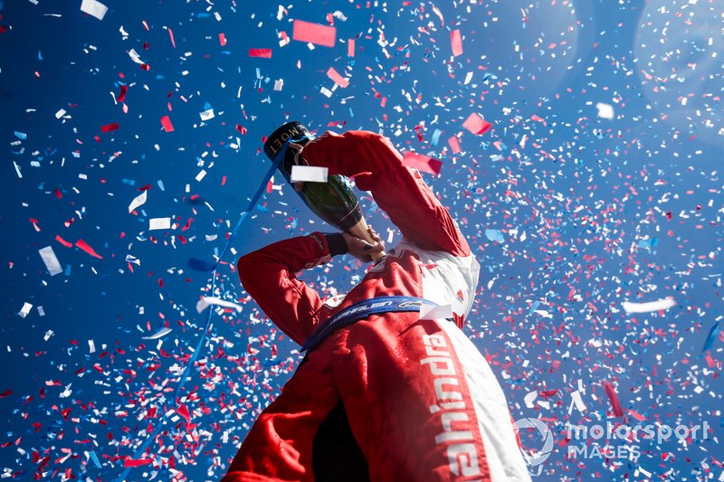 Pascal Wehrlein, Mahindra Racing, celebrates his maiden podium finish on the podium