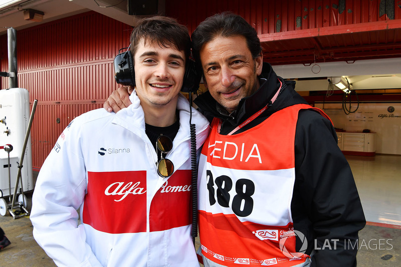 Charles Leclerc, Alfa Romeo Sauber F1 Team and Jean-Michel Tibi, FOM Cameraman