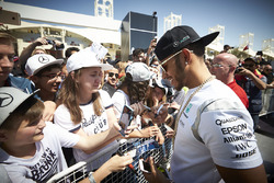 Lewis Hamilton, Mercedes AMG F1 Team signs autographs for the fans