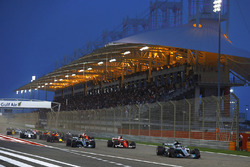 Valtteri Bottas, Mercedes AMG F1 W08, leads Sebastian Vettel, Ferrari SF70H, and Lewis Hamilton, Mercedes AMG F1 W08, at the start of the race