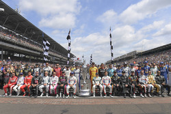 The starting field poses for a class photo