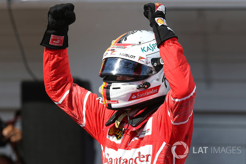 Il vincitore della gara Sebastian Vettel, Ferrari