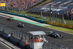Valtteri Bottas, Mercedes-Benz F1 W08 Hybrid and Lewis Hamilton, Mercedes-Benz F1 W08 Hybrid take the chequered flag