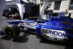 The Sauber Formula 1 team display a message of