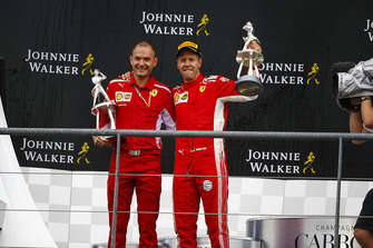David Sanchez, Principal Aerodynamicist, Ferrari, and Sebastian Vettel, Ferrari, 1st position, with their trophies