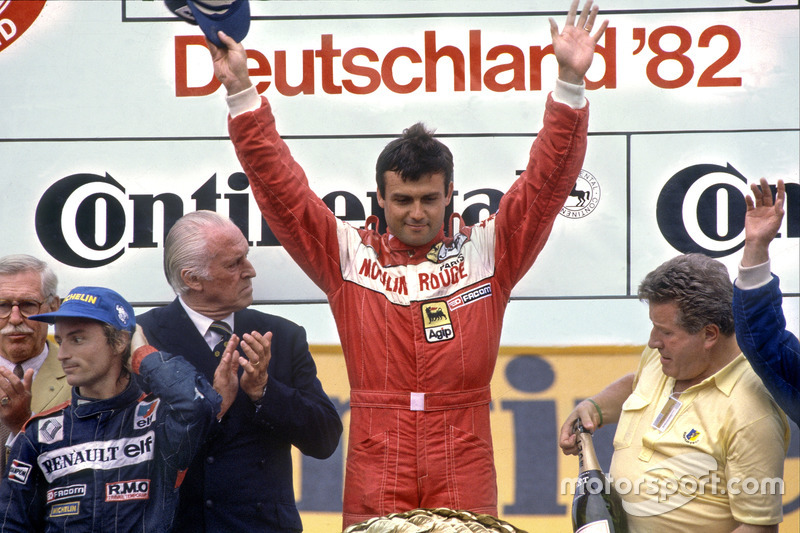 Rene Arnoux, Renault RE30B, 2nd position, and Patrick Tambay, Ferrari 126C2, 1st position, podium