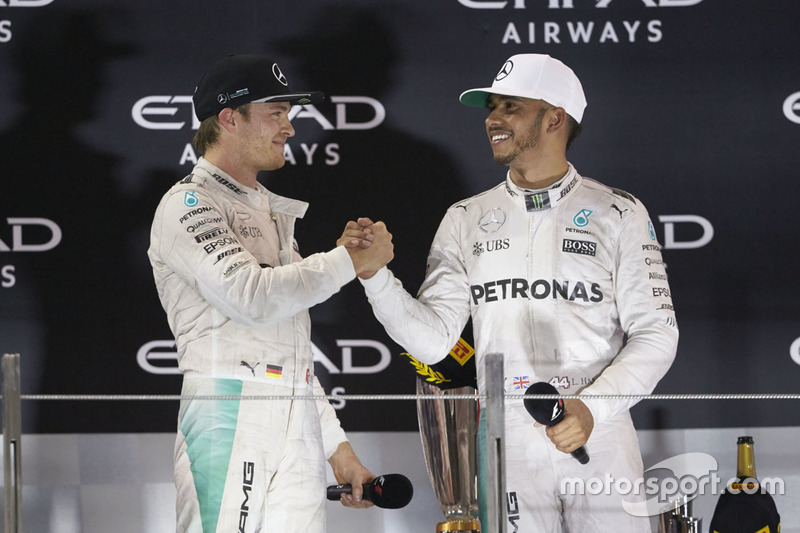 World Champion Nico Rosberg, Mercedes AMG F1 shakes hands with team mate and race winner Lewis Hamilton, Mercedes AMG F1