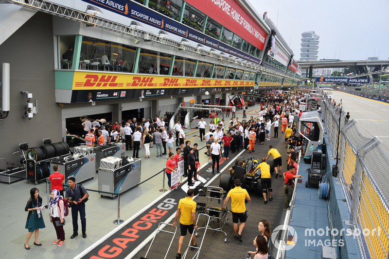 Fans in pit lane