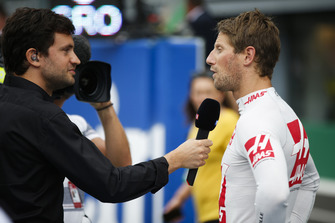 Romain Grosjean, Haas F1 Team, is interviewed on the grid