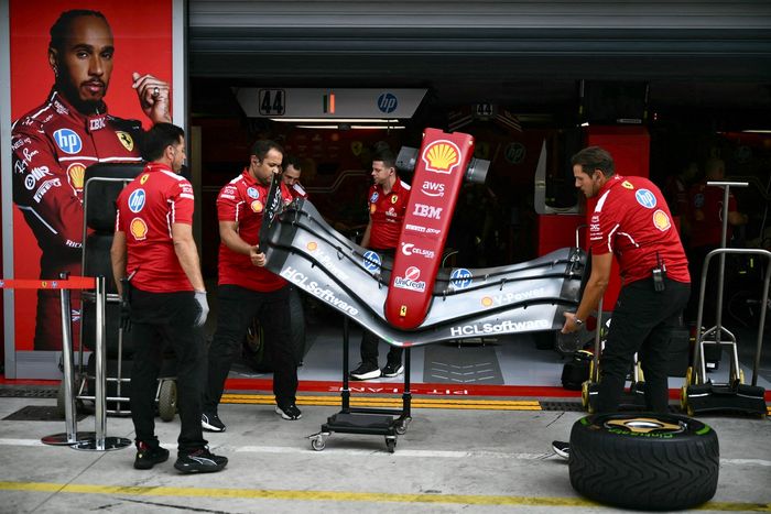 Ferrari team mechanics at work