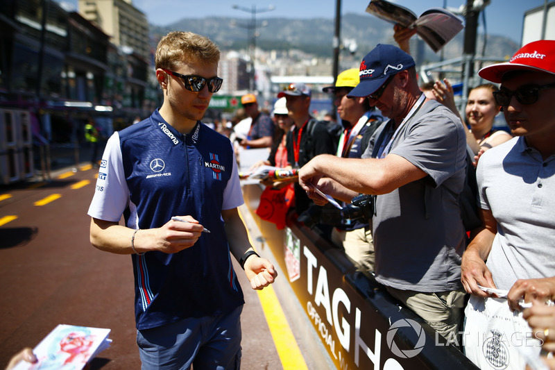 Sergey Sirotkin, Williams Racing, signs autographs for fans