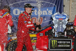 Kyle Busch, Joe Gibbs Racing, Toyota Camry Skittles Red White & Blue celebrates in victory lane