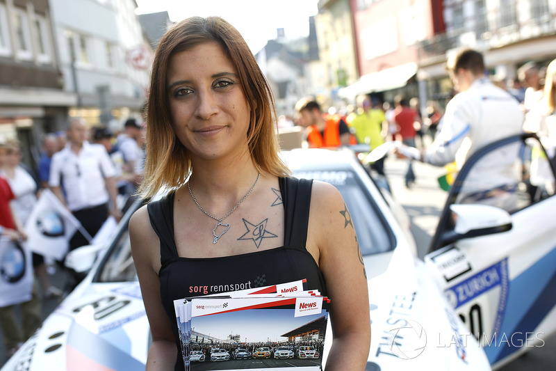 Grid girls of #60 Securtal Sorg Rennsport BMW M4 GT4: Dirk Adorf, Tom Coronel, Beitske Visser, Nico Menzel