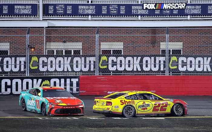 Denny Hamlin and Joey Logano spin