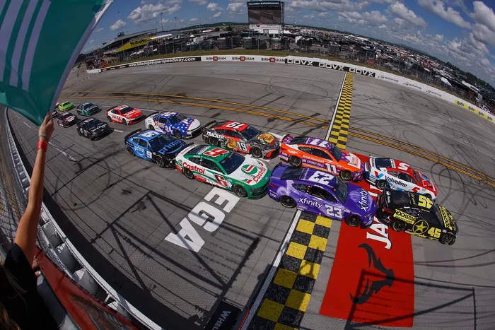 Tyler Reddick, 23XI Racing, Kyle Larson, Hendrick Motorsports