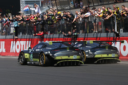 Checkered flag for #95 Aston Martin Racing Aston Martin Vantage: Nicki Thiim, Marco Sorensen, Richie Stanaway and #97 Aston Martin Racing Aston Martin Vantage: Darren Turner, Jonny Adam, Daniel Serra