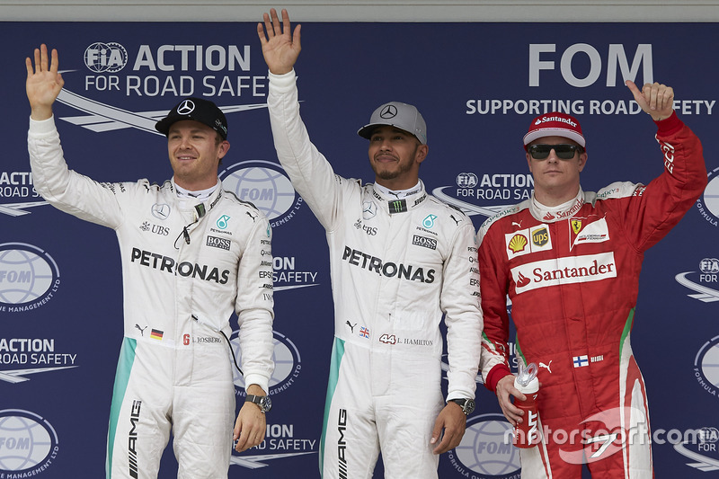 Qualifying top three in parc ferme (L to R): Nico Rosberg, Mercedes AMG F1, second; Lewis Hamilton, 