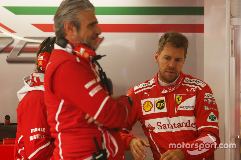 Maurizio Arrivabene, Team Principal, Ferrari, and Sebastian Vettel, Ferrari