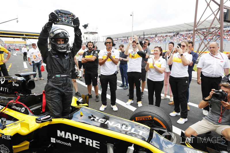 Aseel Al-Hamad, returns to the pits after driving a 2012 Lotus E20 Renault F1 car in the Renault Passion Parade