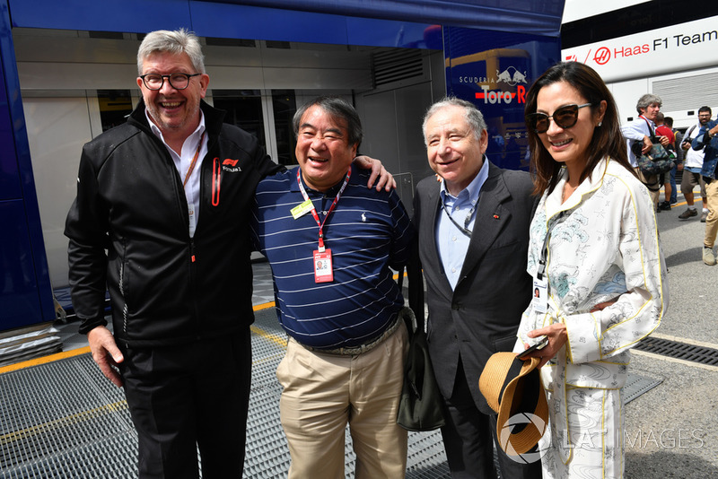 (L to R): Ross Brawn, Formula One Managing Director of Motorsports, Hirohide Hamashima, Former Head of Bridgestone Tyre Development, Jean Todt, FIA President and his wife Michelle Yeoh, 