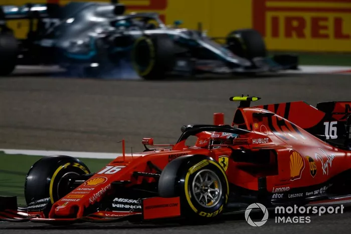 Charles Leclerc, Ferrari SF90, leads Valtteri Bottas, Mercedes AMG W10