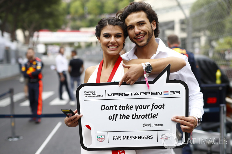 Models display messages from fans on the grid