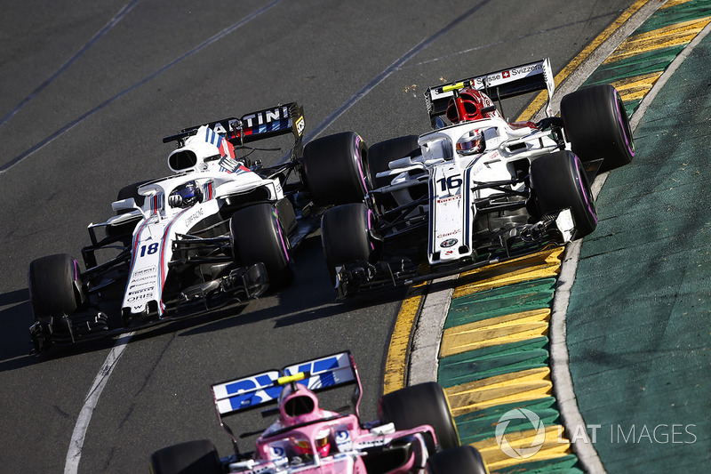 Esteban Ocon, Force India VJM11 Mercedes, precede Charles Leclerc, Sauber C37 Ferrari, e Lance Stroll, Williams FW41 Mercedes