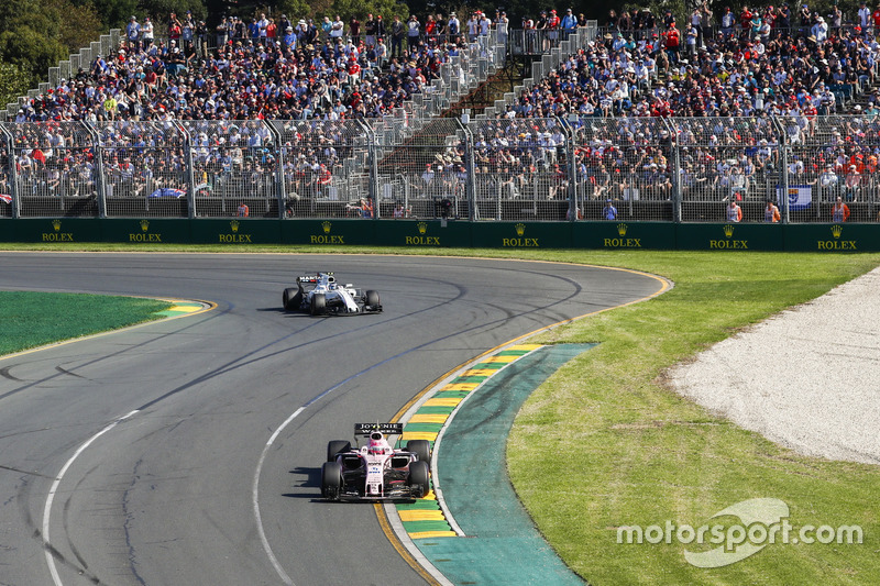 Esteban Ocon, Force India VJM10, leads Lance Stroll, Williams FW40