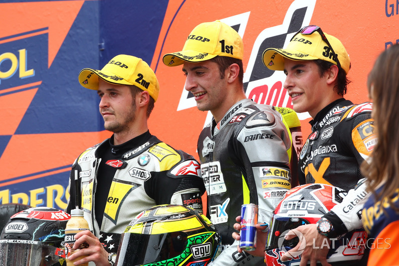 Podium: second place Thomas Luthi, Race winner Andrea Iannone, third place Marc Marquez