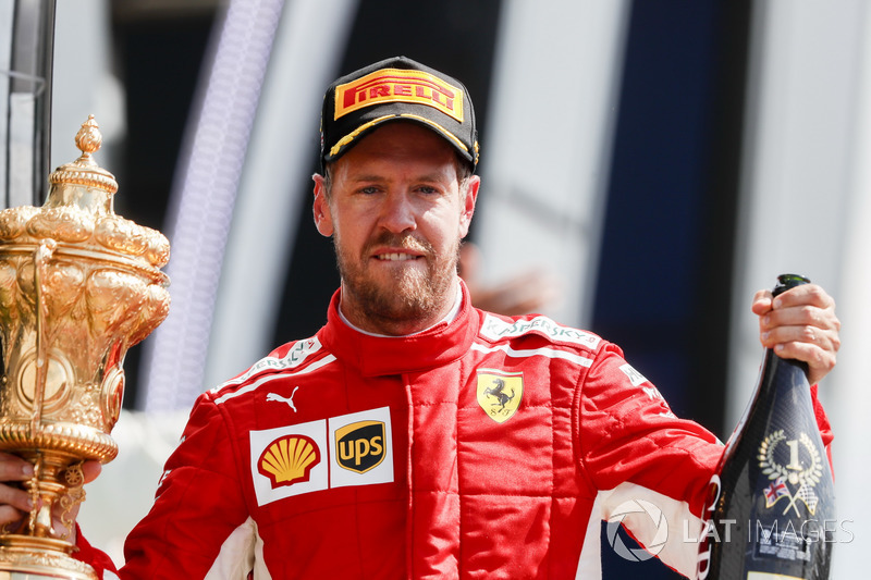 Sebastian Vettel, Ferrari, celebrates on the podium