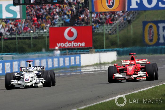 Nick Heidfeld, BMW Sauber F1.06 en lutte avec Michael Schumacher, Ferrari 248 F1