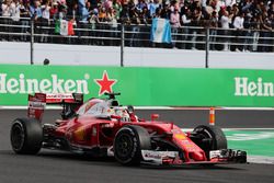 Sebastian Vettel, Ferrari SF16-H waves to the crowd at the end of the race