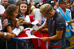 Kevin Magnussen, Haas F1 Team, signs autographs for fans