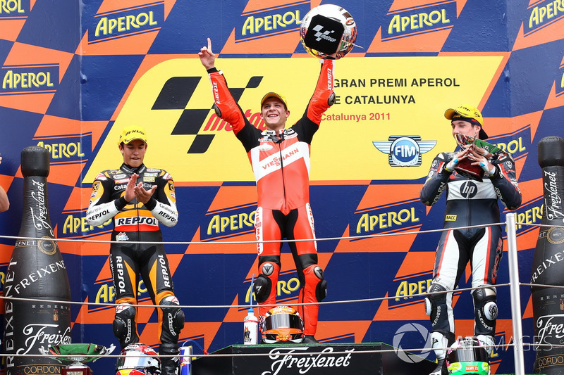 Podio: il secondo classificato Marc Marquez, il vincitore della garaStefan Bradl, il terzo classific