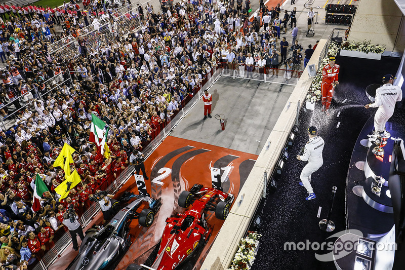 Podium: race winner Sebastian Vettel, Ferrari, second place Lewis Hamilton, Mercedes AMG F1, third p