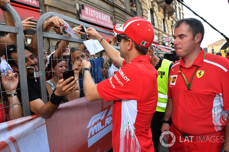 Sebastian Vettel, Ferrari signs autographs for the fans
