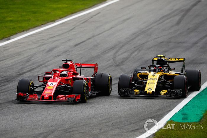 Sebastian Vettel, Ferrari SF71H, y Carlos Sainz Jr., Renault Sport F1 Team R.S. 18