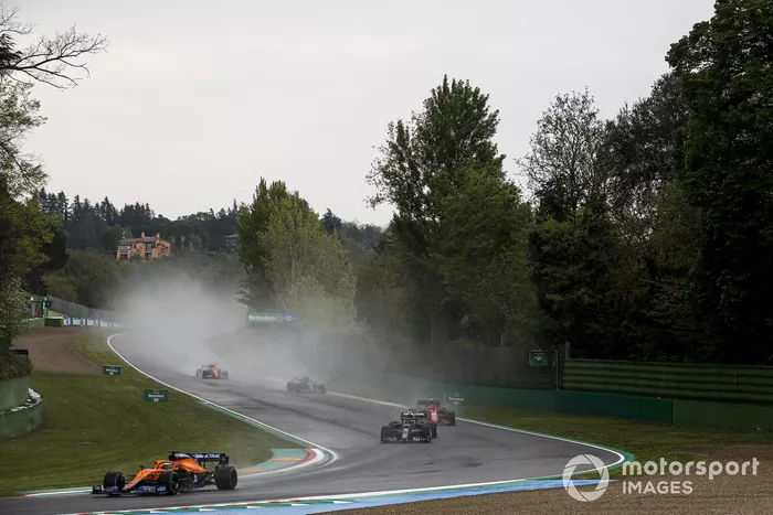 Daniel Ricciardo, McLaren MCL35M, Pierre Gasly, AlphaTauri AT02, and Carlos Sainz Jr., Ferrari SF21