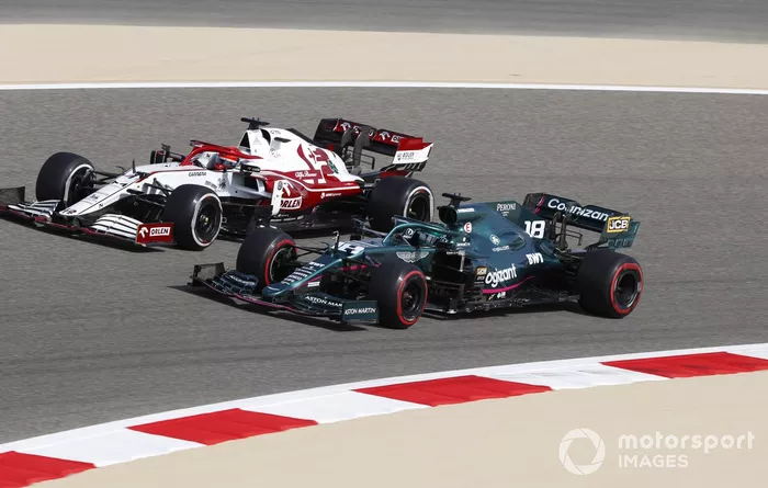 Lance Stroll, Aston Martin AMR21, Kimi Raikkonen, Alfa Romeo Racing C41