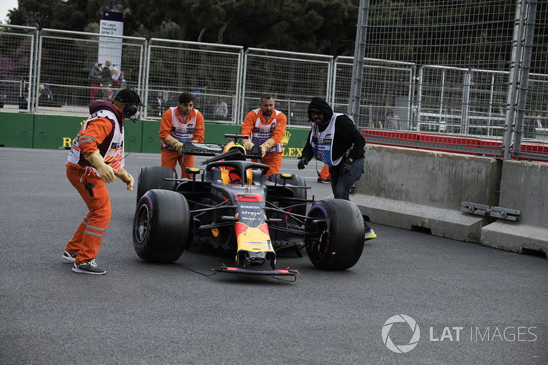 The carshed car of Daniel Ricciardo, Red Bull Racing RB14 is recovered