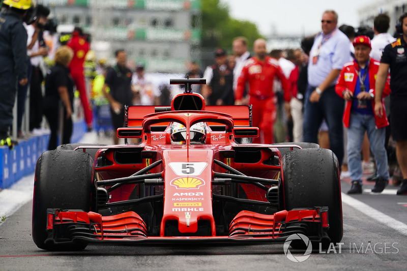 Sebastian Vettel, Ferrari SF71H, 1st position, drives into Parc Ferme