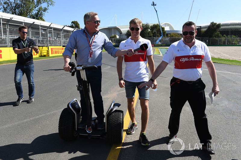 Marcus Ericsson, Alfa Romeo Sauber F1 Team walks the track and talks with Johnny Herbert, Sky TV